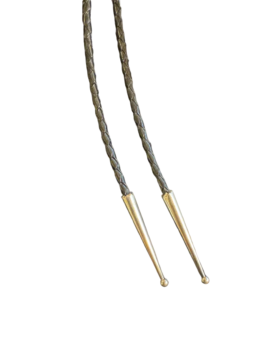 Braided cord with gold ends on a white background