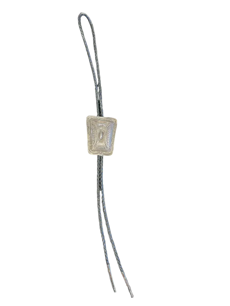 Bolo tie with a square silver clasp on a white background