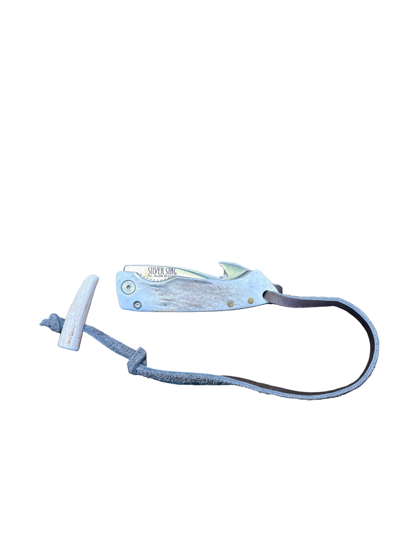 Metal tool with a cord on a textured surface