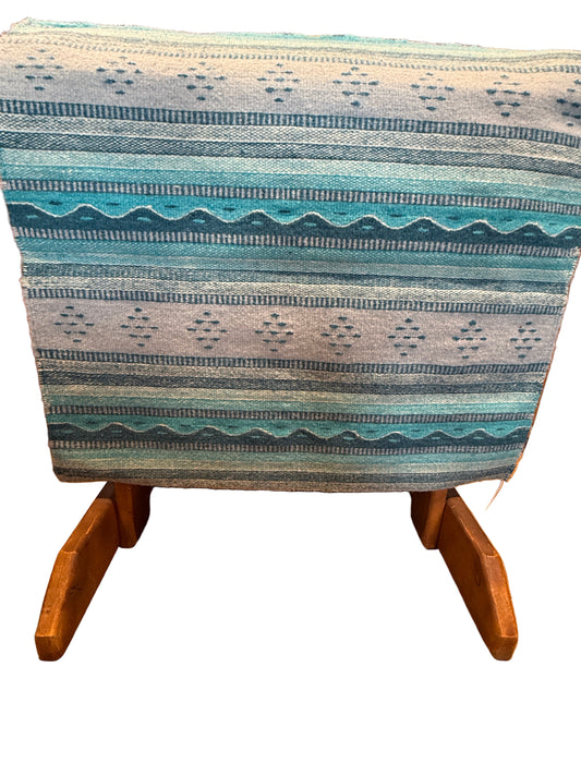 Chair with a patterned fabric cover on a white background