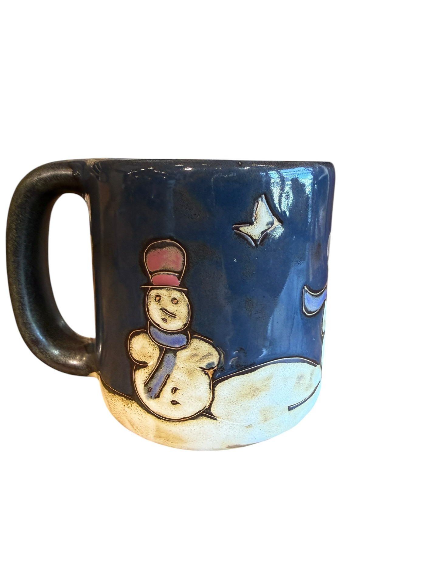 Ceramic mug with a snowman design on a white background