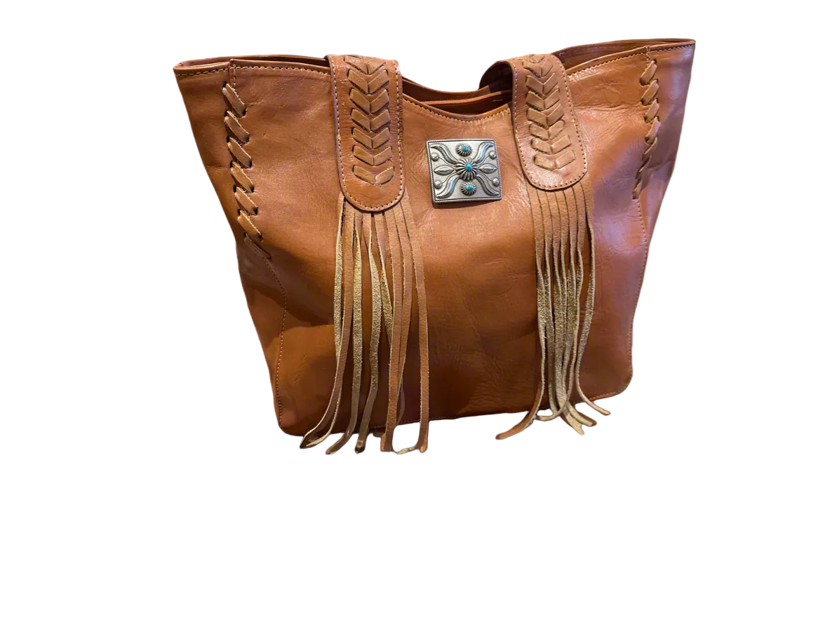Brown leather handbag with fringe details on a white background