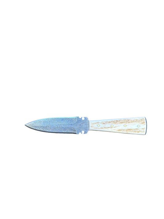 Knife with decorative handle on a white background