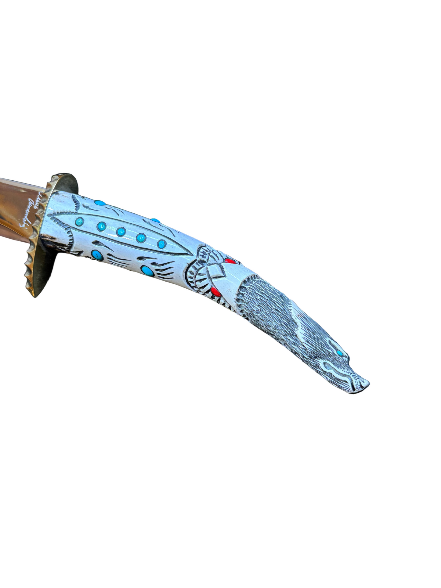 Decorative sword sheath with intricate patterns on a white background