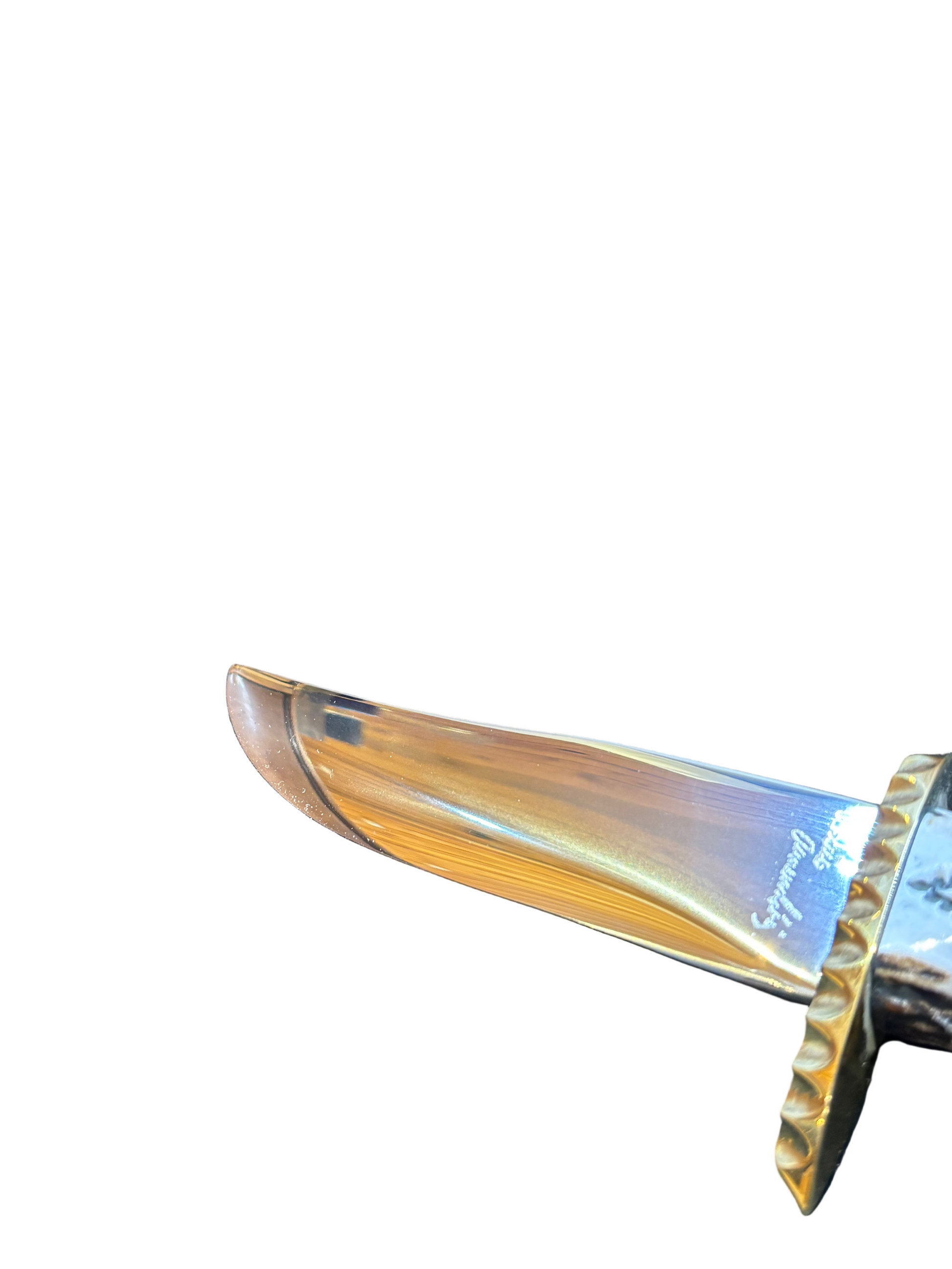 Decorative dagger with a metallic blade and wooden handle on a white background