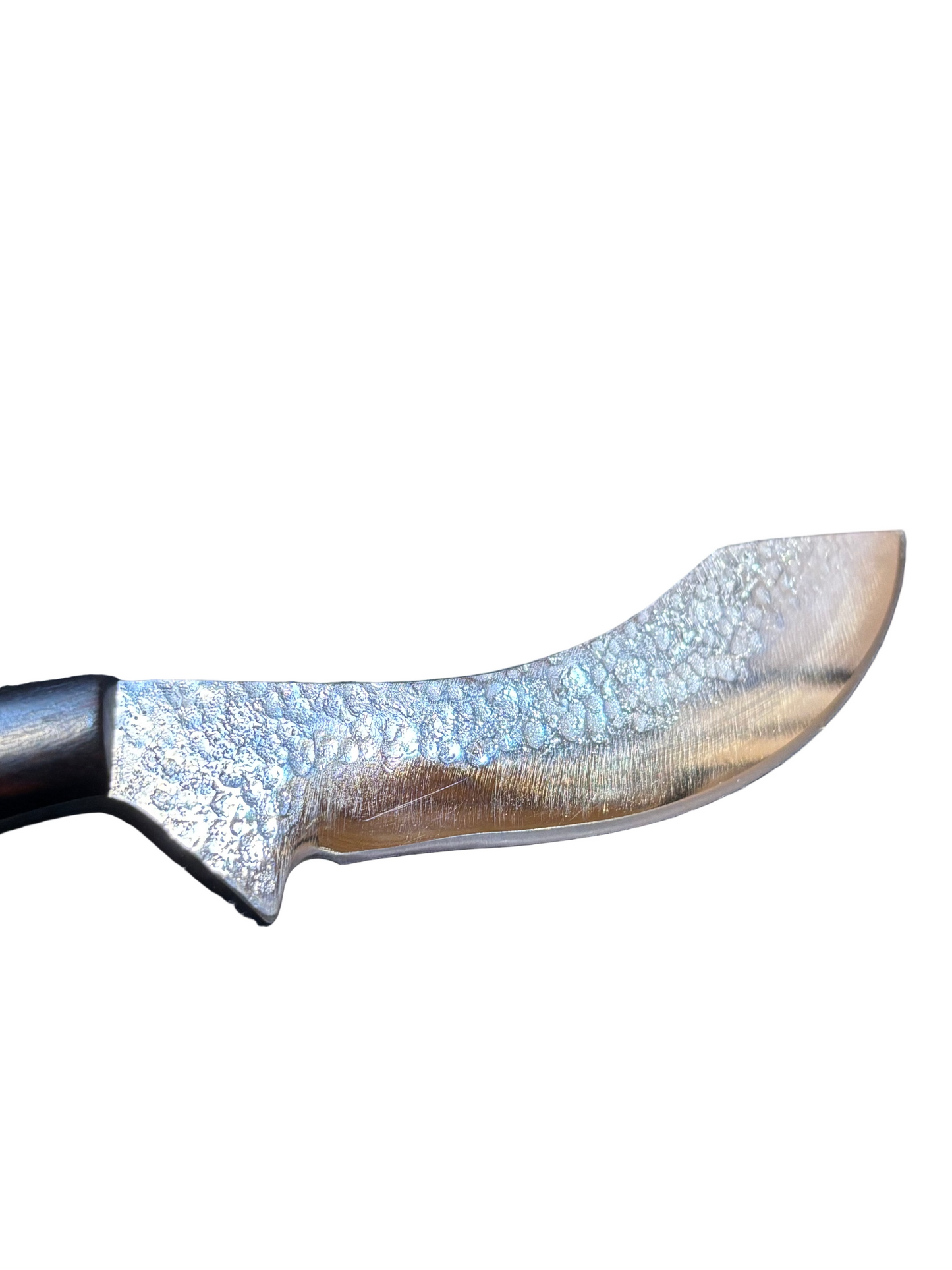 Close-up of a curved knife blade with a black handle on a white background