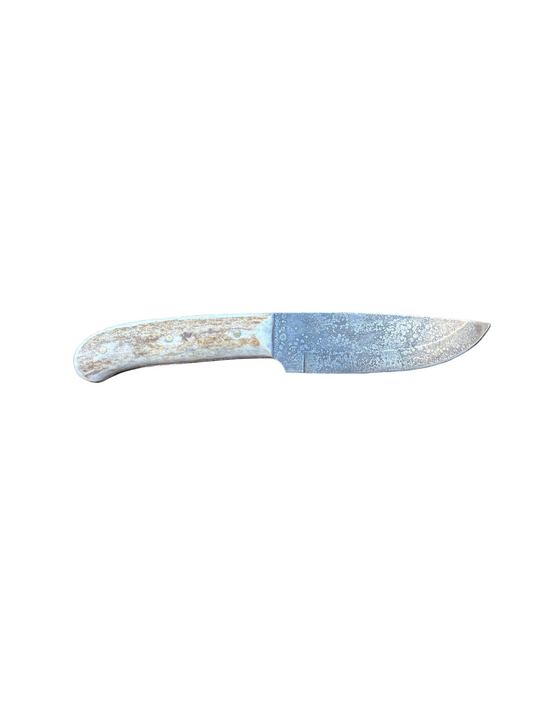 Knife with a decorative handle on a white background