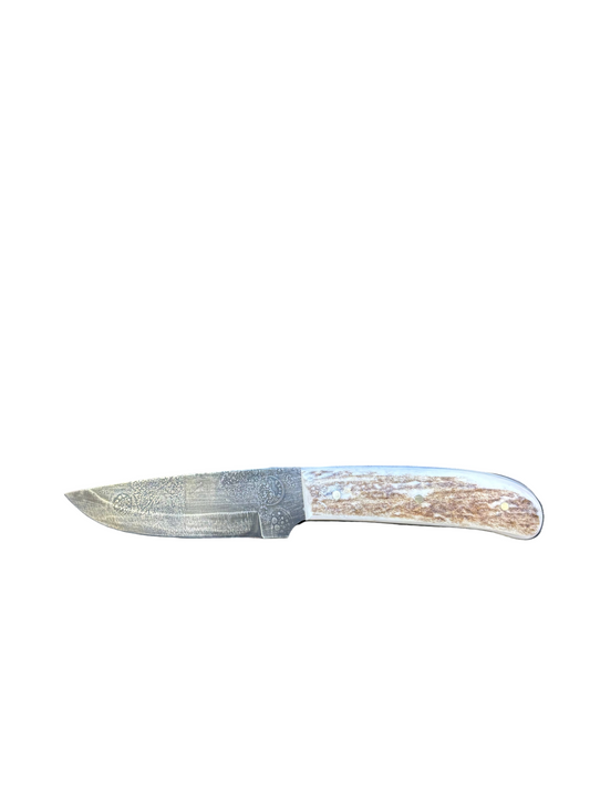 Knife with a decorative handle on a white background