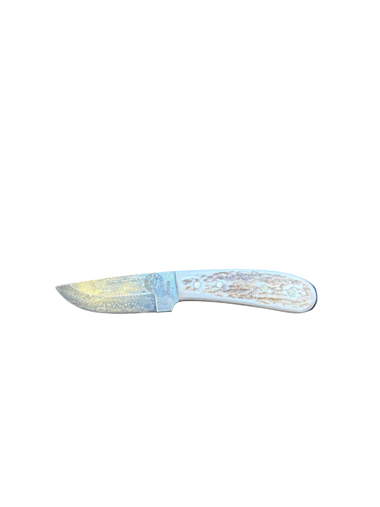 Small knife with a decorative handle on a white background