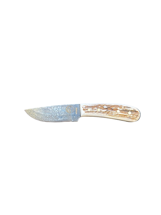 Knife with a decorative handle on a white background