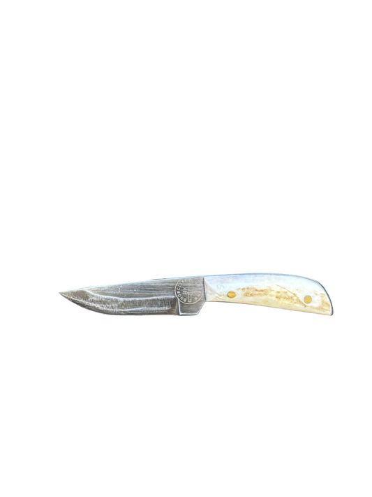 Knife with a decorative handle on a white background