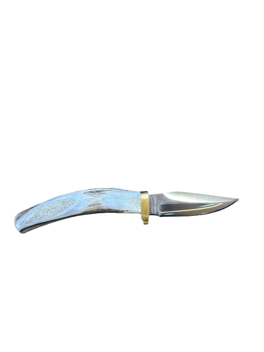 Knife with decorative handle on a white background