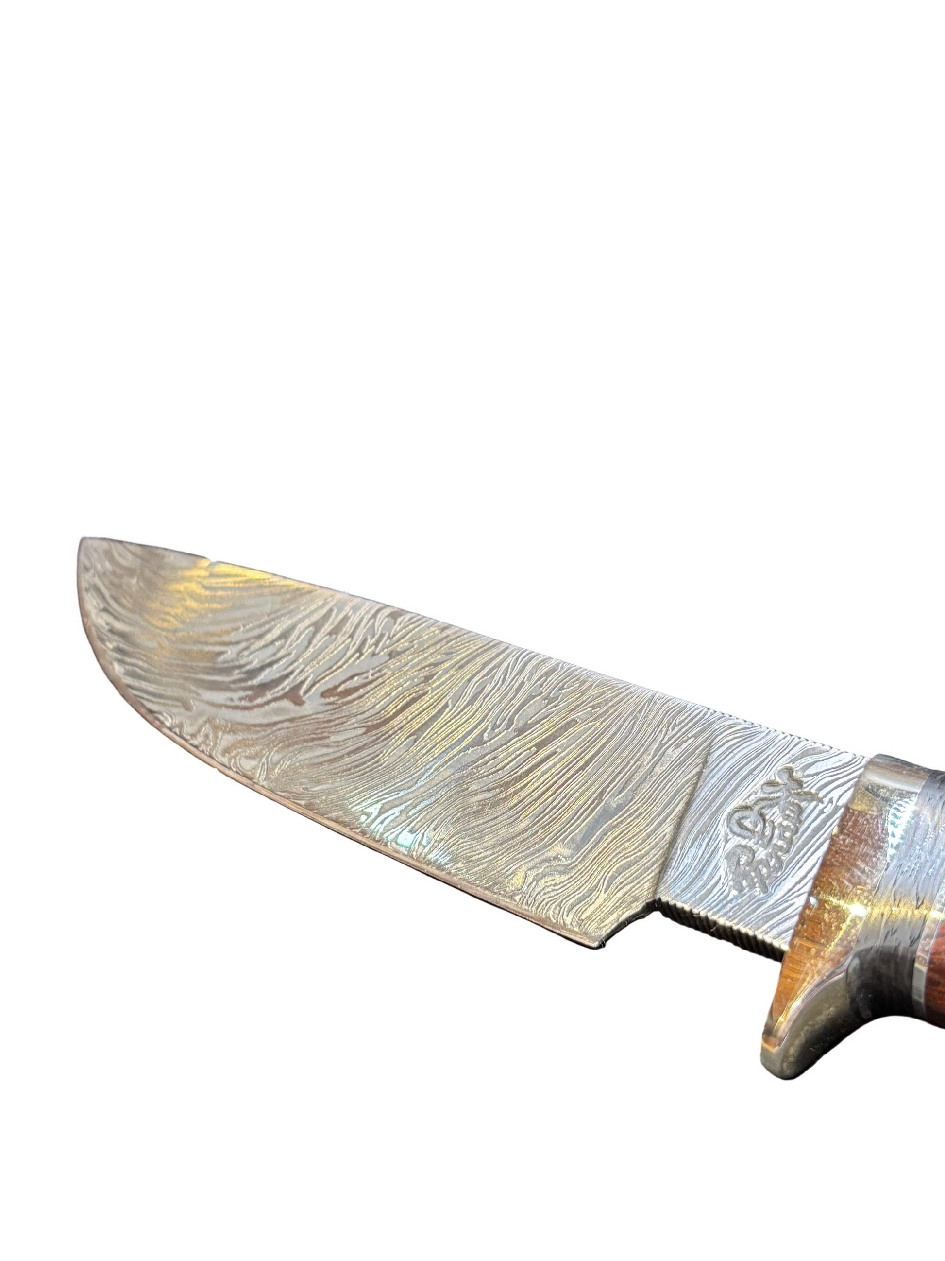 Decorative knife with a detailed blade on a white background