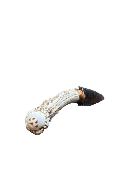 Decorative antler with a patterned fabric background