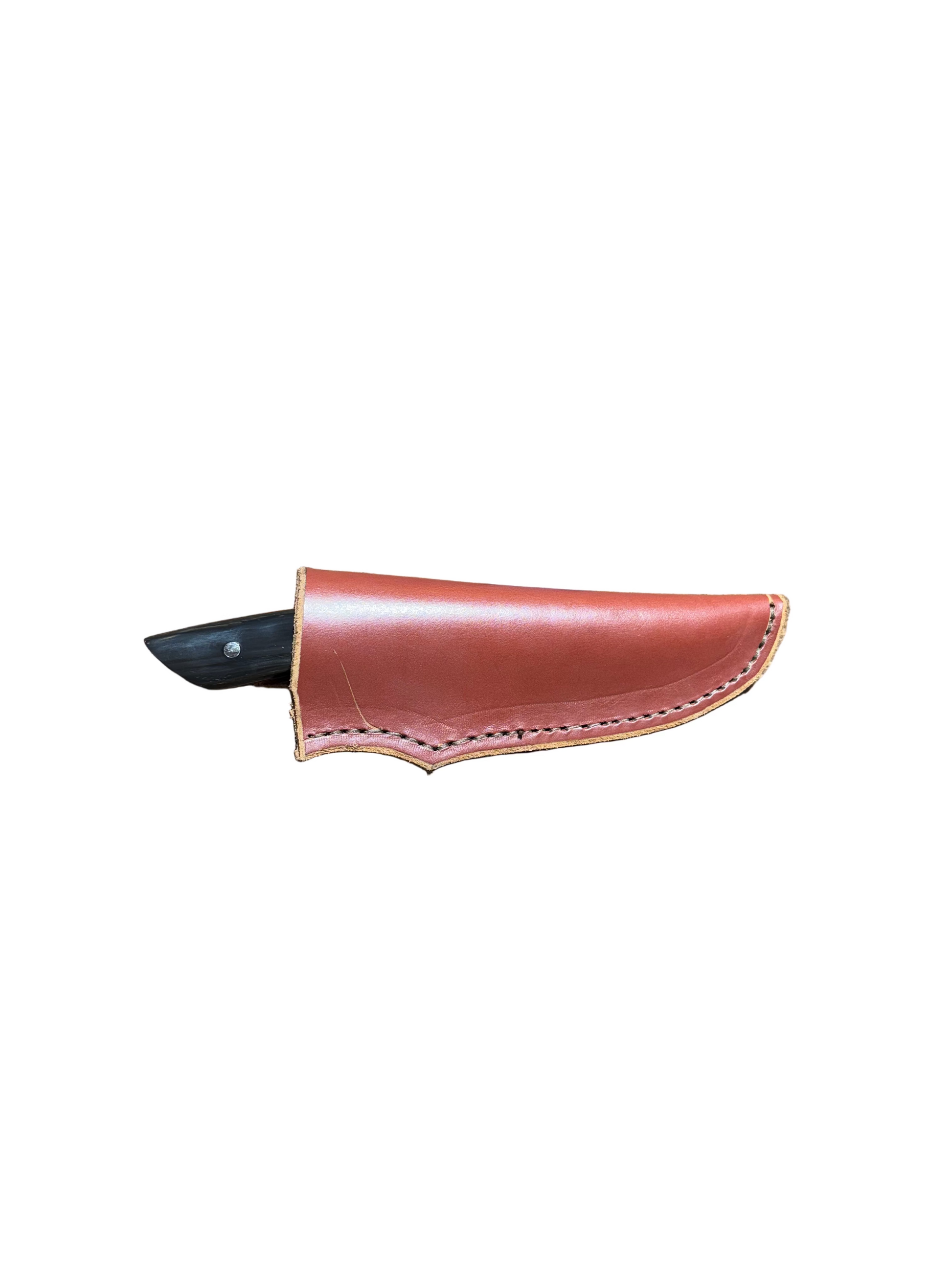 Brown leather knife sheath on a white background
